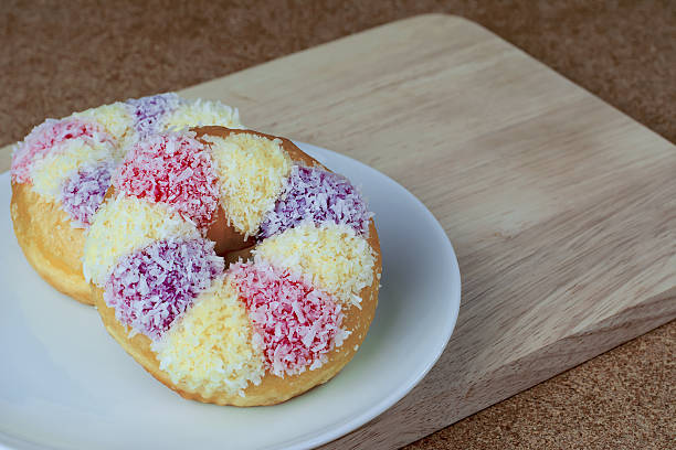istock Colorful bakery cakes on wooden floor 514452486