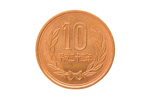 10 yen coin japanese money, close up isolated on white background.