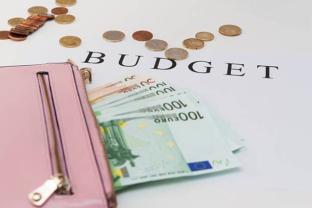 istock Euro banknotes in  wallet on white background 514454492