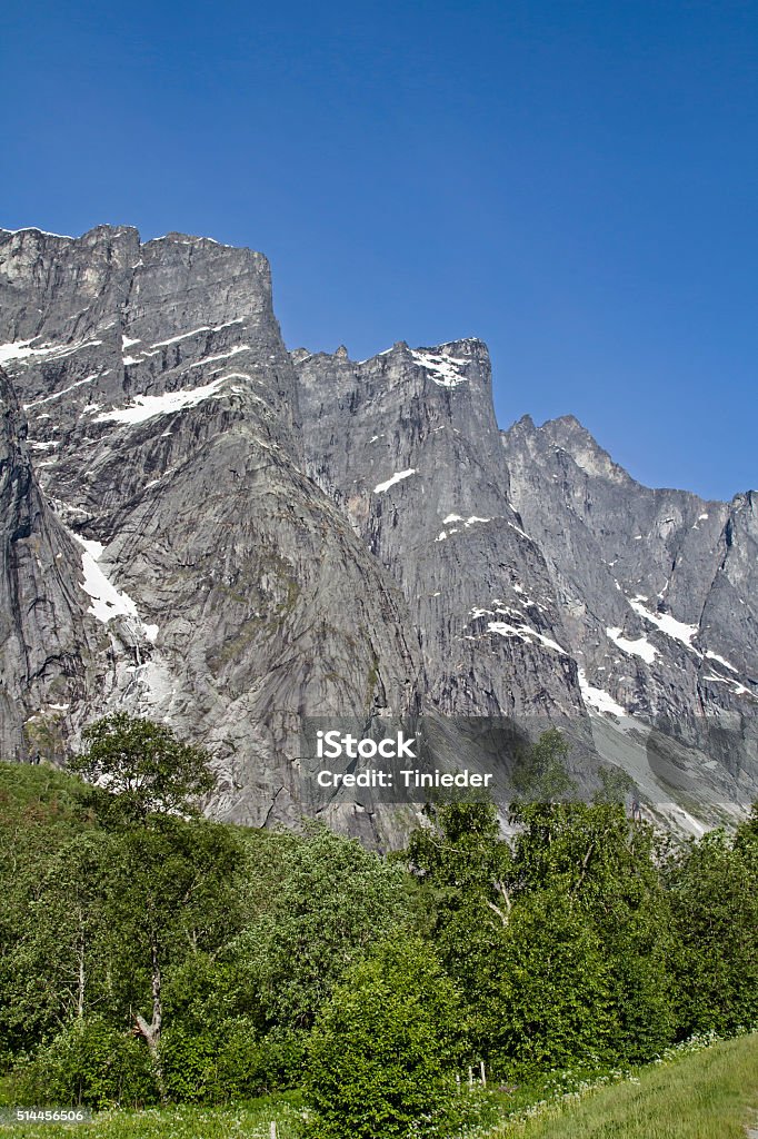 Trollveggen The Troll Wall is  Europe's highest cliff and rises about 1700 feet above the valley floor Cliff Stock Photo
