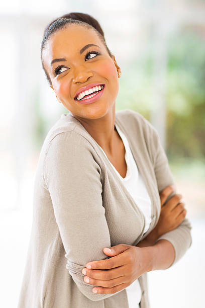 istock african woman with arms crossed 514456607