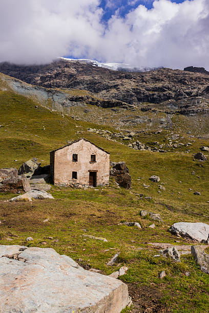 istock Italy. Aosta Valley. Monte Rosa Massif. Hut for summer pasture 514456789