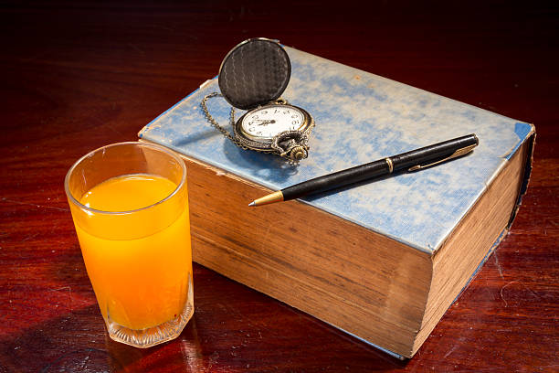 istock Book with pen,watch and orange juice. 514458175