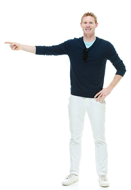 istock Cheerful casual man pointing away 514458441
