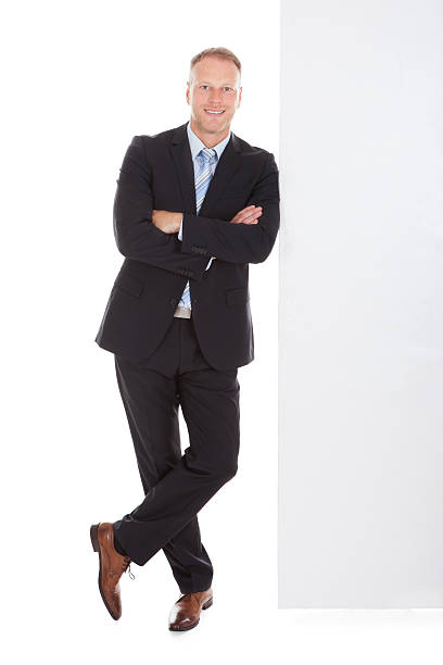 istock Businessman Leaning Over White Background 514458851