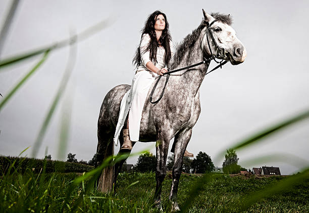 istock Beautiful woman and her horse 514459595