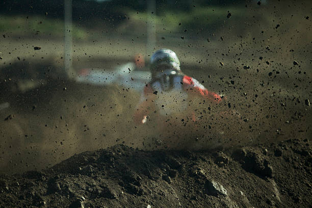 istock Off-road motorbike cornering in dirt 514460758