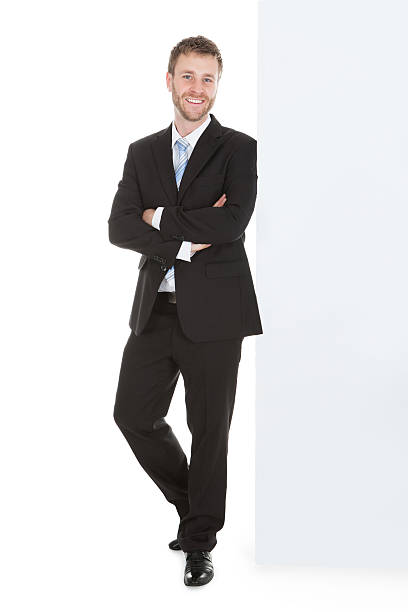 istock Businessman Leaning Over White Background 514461607