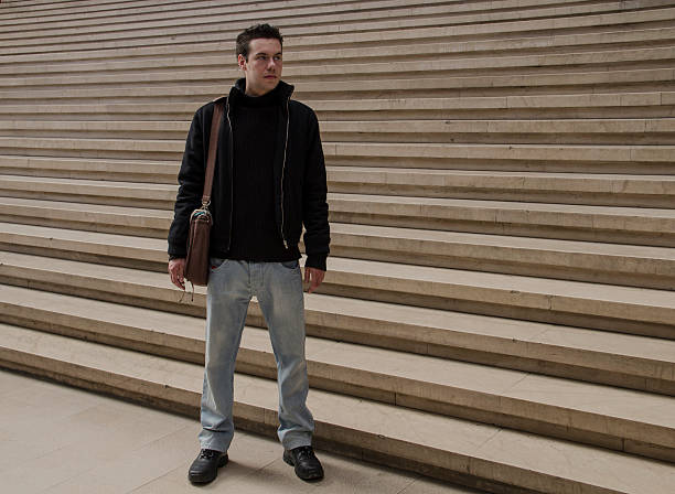 istock Young Man Beside A Staircase 01 514463494