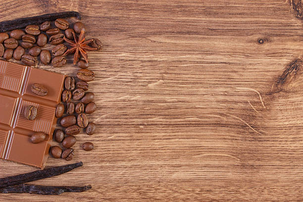 istock Milk chocolate, fragrant vanilla sticks and coffee grains 514464176