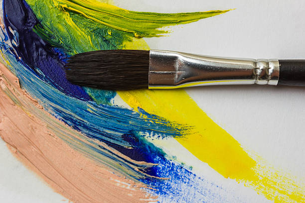 istock colored paints and brushes for painting 514464186