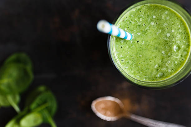 istock Green smoothie in glass 514466660