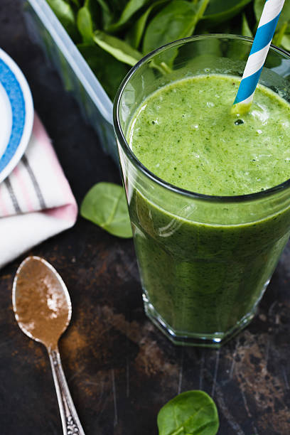 istock Green smoothie in glass 514467438