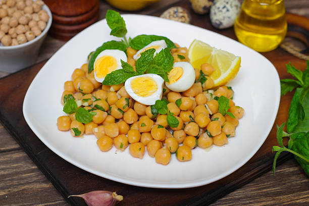 istock Dish of chickpeas with mint, olive oil and lemon 514467524