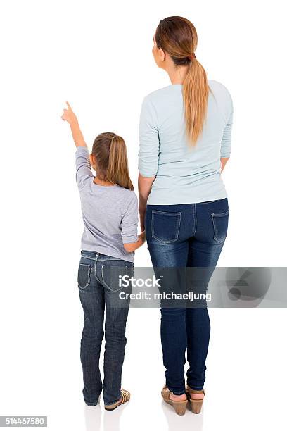 Young Mother And Daughter Pointing Stock Photo - Download Image Now - Rear View, Child, People