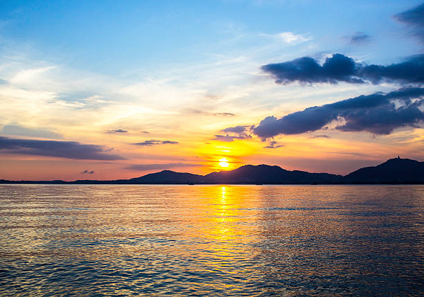 istock Sunset with mountant on seascape 514469076