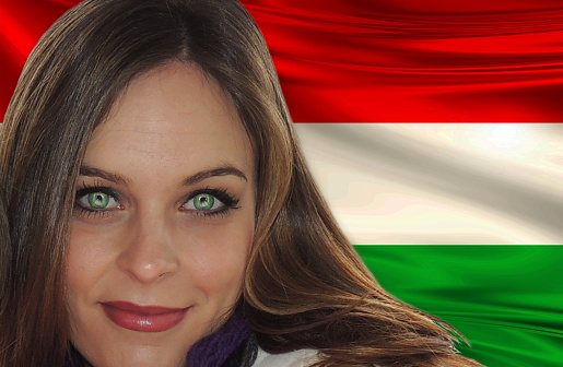 Hungarian girl in front of flag