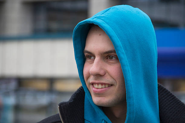 istock Young Man With A Blue Hood 03 514470774