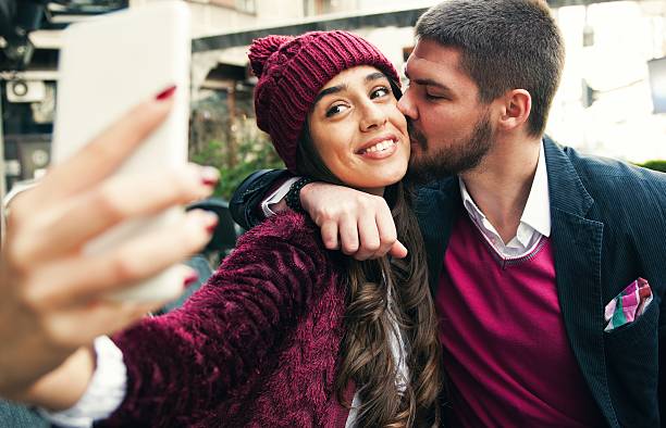 istock Couple taking a selfie with smartphone 514470812