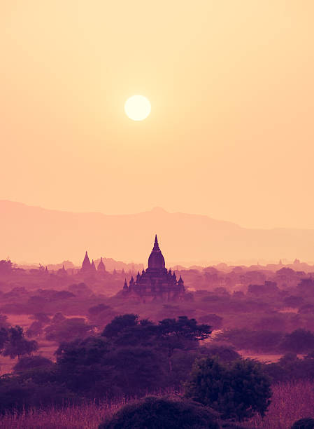 vintage filter : Silhouette Sunset scene with Pagoda field