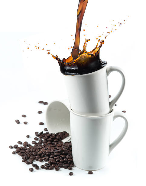 istock Coffee splash with Stacked white coffee cups 514474060