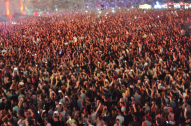 istock Blurred crowd of people partying 514475188
