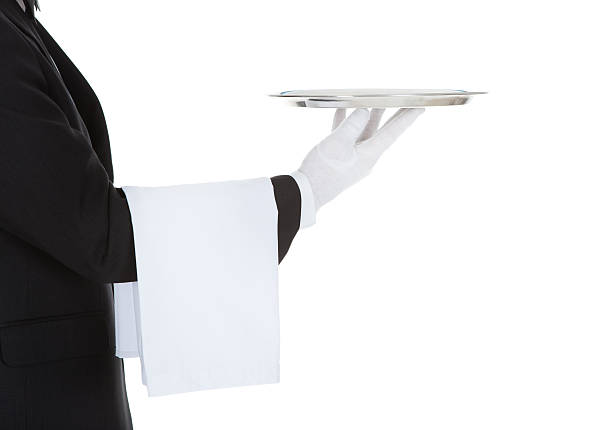 istock Cropped Image Of Waiter Holding Empty Tray 514477103