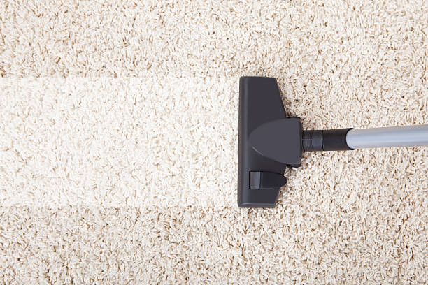 istock Vacuum Cleaner On Rug At Home 514477881