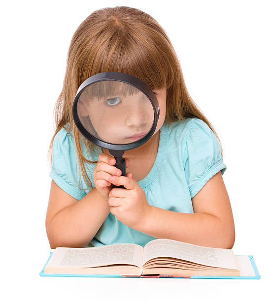 istock Cute girl is reading book 514478121