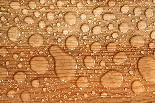 water drop on a wooden background