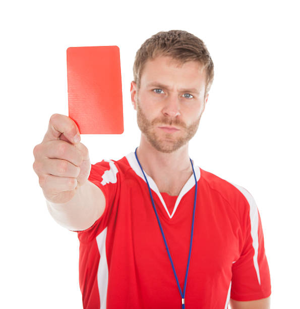 istock Portrait Of Referee Showing Red Card 514480265