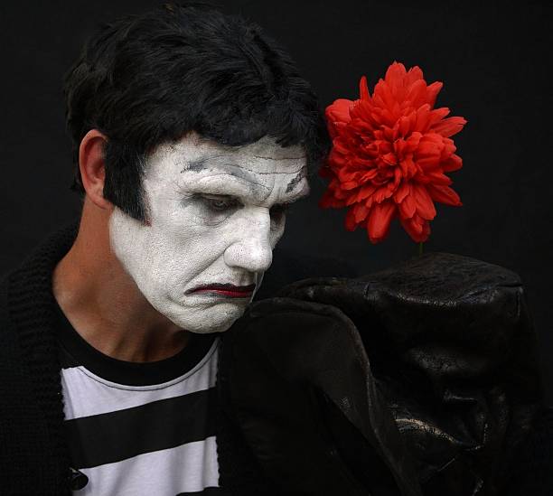 istock man dressed as mime artist expressing sadness 514481381