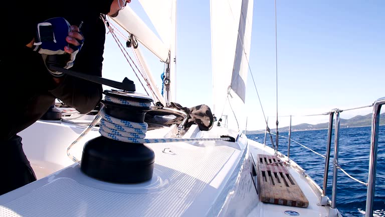 SLO MO Turning The Winch Handle On A Boat