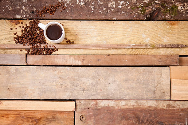 istock Coffee and cup with roasted beans on wooden board background. 514481673
