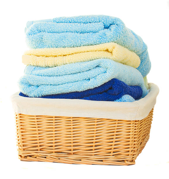 istock Pile of washed towel in basket 514482299