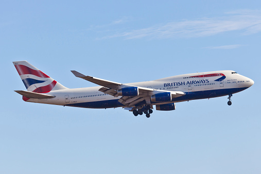 New York, USA - January 28, 2012: Boeing 747 British Airways approaches John F. Kennedy International Airport in New York, USA on January 28, 2012. British Airways is one of the world's most recognised airlines and a founding member of the oneworld alliance.
