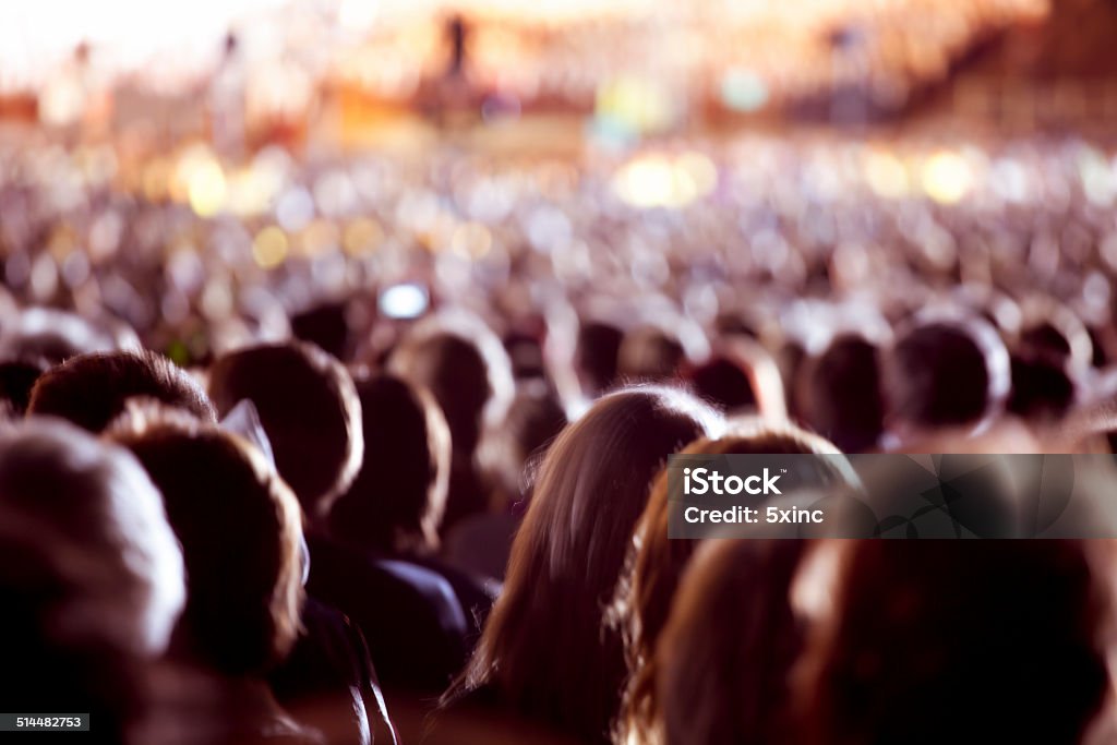 Large crowd of people Large crowd of people watching concert or sport event Large Stock Photo