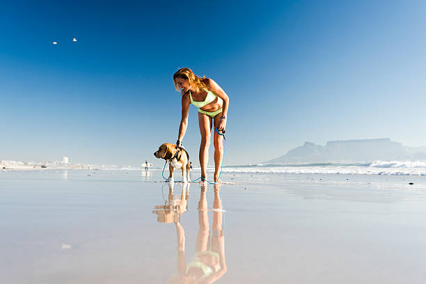 istock Enjoying The Day On The Beach With My Dog 514497838