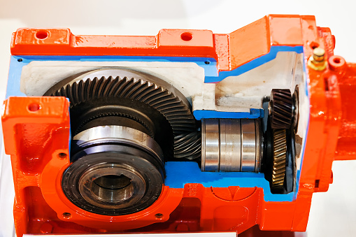 Gearbox on large electric motor at industrial equipment plant