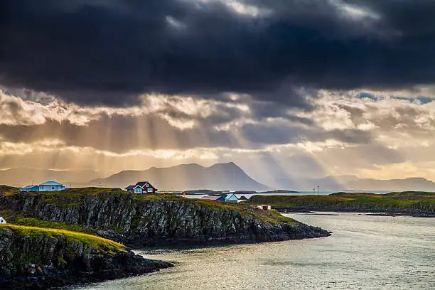 Sun rays over the coastline of Snaefellsnes peninsula near Stykkisholmur in Iceland.