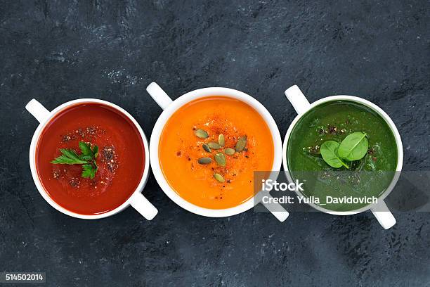 Assortment Of Fresh Vegetable Soup On A Dark Background Stock Photo - Download Image Now