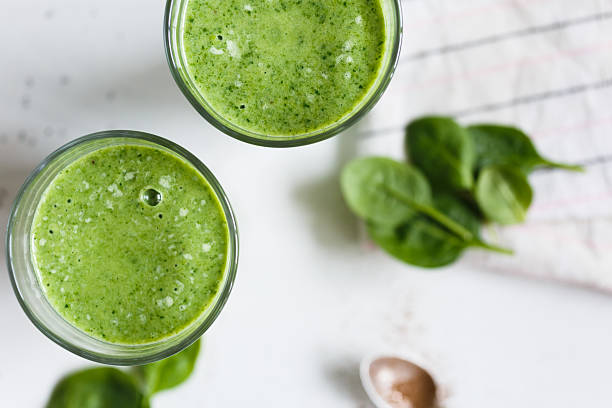 istock Two green smoothie in the glass 514502046