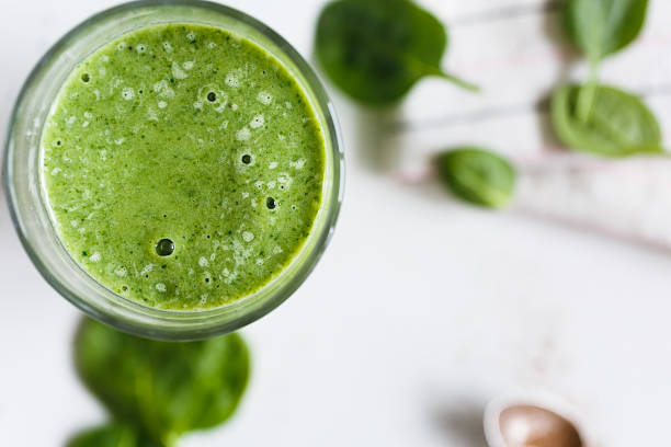 istock Green smoothie in the glass 514502438