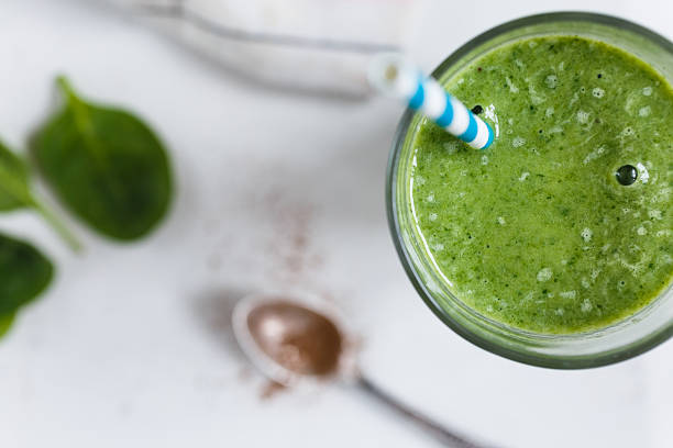 istock Green smoothie in the glass 514503250