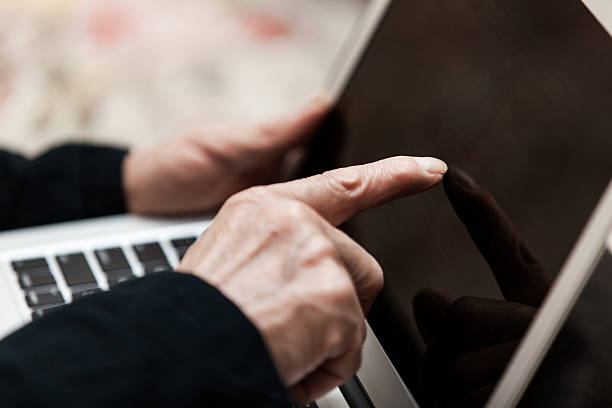 istock Old Asian man touch laptop indoors 514503298