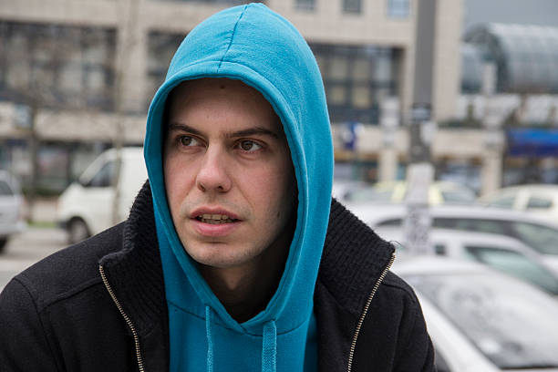 istock Young Man With A Blue Hood 16 514504716