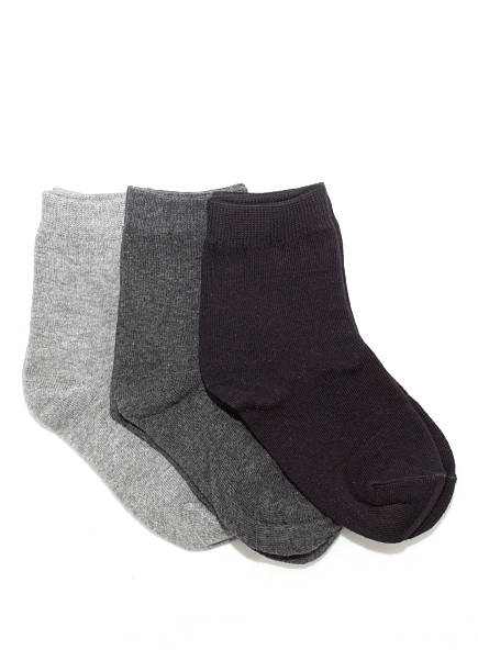 istock Three pairs of grey socks, isolated on white 514505480