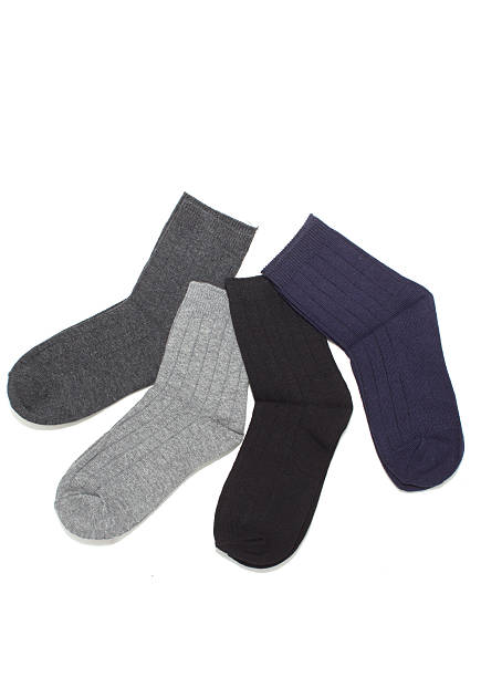 istock Four pairs of grey socks, isolated on white 514505580
