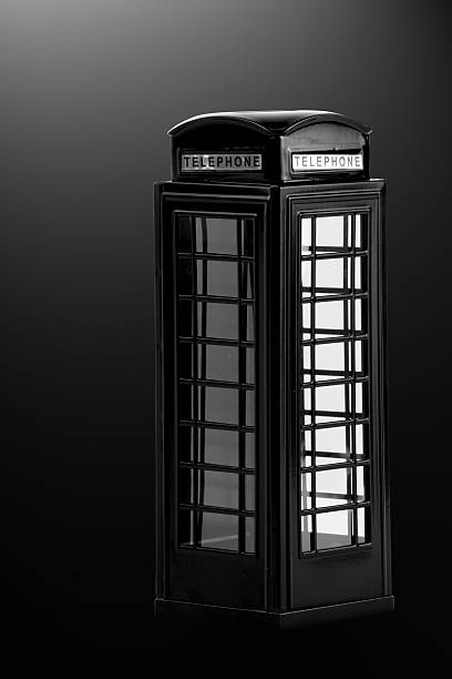 istock Traditional telephone booth in London on grey background 514505920