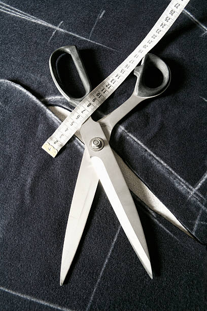istock Tailor Tools of Trade - Scissors and Tape Measure. 514506604